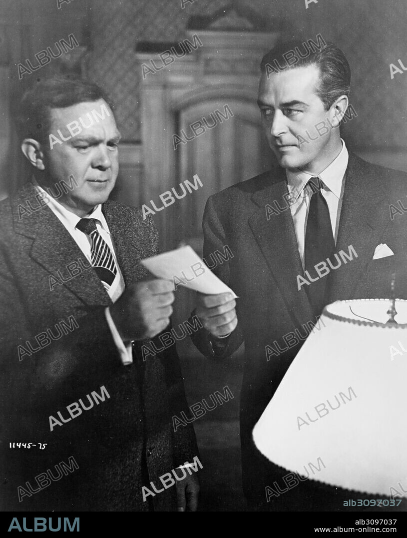 RAY MILLAND and THOMAS MITCHELL in ALIAS NICK BEAL, 1949, directed by JOHN FARROW. Copyright PARAMOUNT PICTURES.