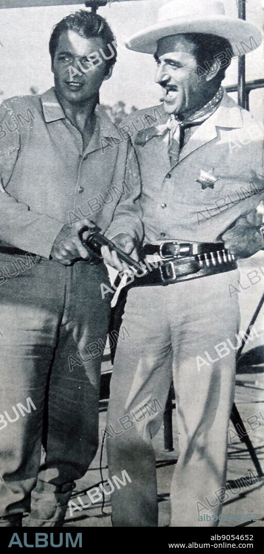 Audie Leon Murphy and Gilbert Roland in The Wild and the Innocent, a 1959 American CinemaScope Western film. Audie Leon Murphy (20 June 1925 - 28 May 1971) was an American soldier, actor, songwriter, and rancher. He was one of the most decorated American combat soldiers of World War II. Gilbert Roland (born Luis Antonio Damaso de Alonso, December 11, 1905 - May 15, 1994) was a Mexican-born American film and television actor whose career spanned seven decades from the 1920s until the 1980s.