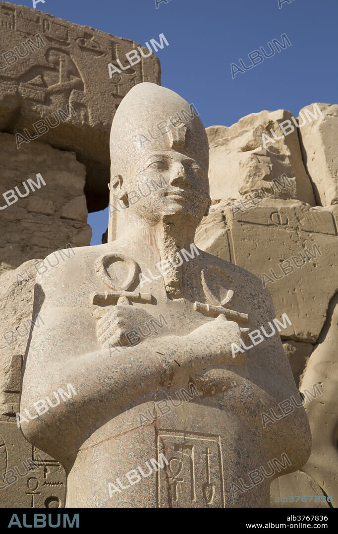 Statue of Pharaoh, Precinct of Amun-Re, Karnak Temple, Luxor, Thebes, UNESCO World Heritage Site, Egypt, North Africa, Africa.