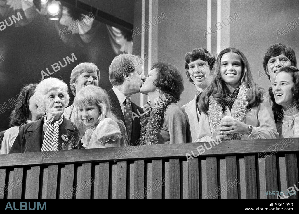 Jimmy Carter and Rosalynn Carter kissing, surrounded by family including Amy Carter and Lillian Carter, at Democratic National Convention, New York City, New York, USA, Warren K. Leffler, July 15, 1976.