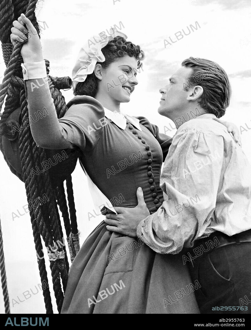 DOUGLAS FAIRBANKS JR. and MARGARET LOCKWOOD in RULERS OF THE SEA, 1939, directed by FRANK LLOYD. Copyright PARAMOUNT PICTURES.