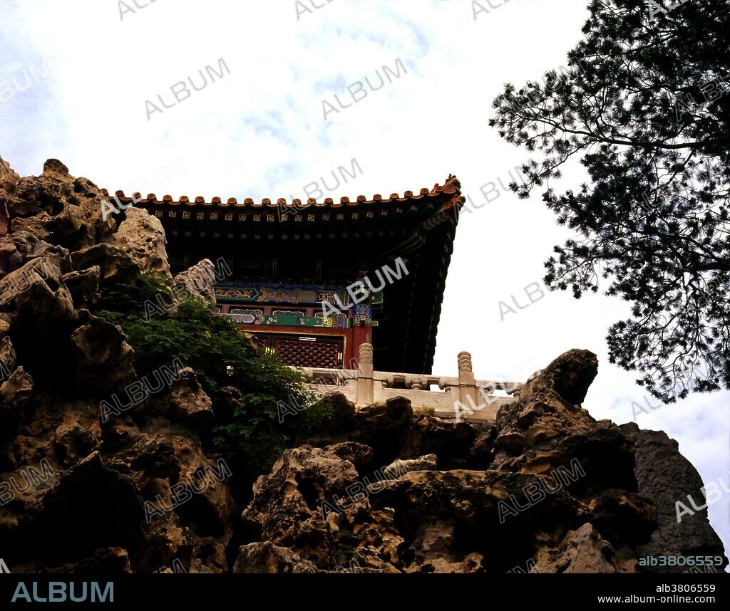 Yu Jing Ting Pavilion atop the Hill of Accumulated Elegance, in the garden area of the Forbidden City. The Forbidden City, when opened to the public in 1925 was renamed the Palace Museum, and was home to the Ming and Qing dynasties. Building took fourteen years, and was completed in 1420. Covering 720,000 square meters, it is the largest and best preserved palace in the world.