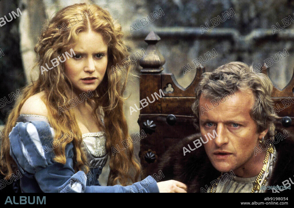 JENNIFER JASON LEIGH and RUTGER HAUER in FLESH+BLOOD, 1985, directed by PAUL VERHOEVEN. Copyright ORION PICTURES.