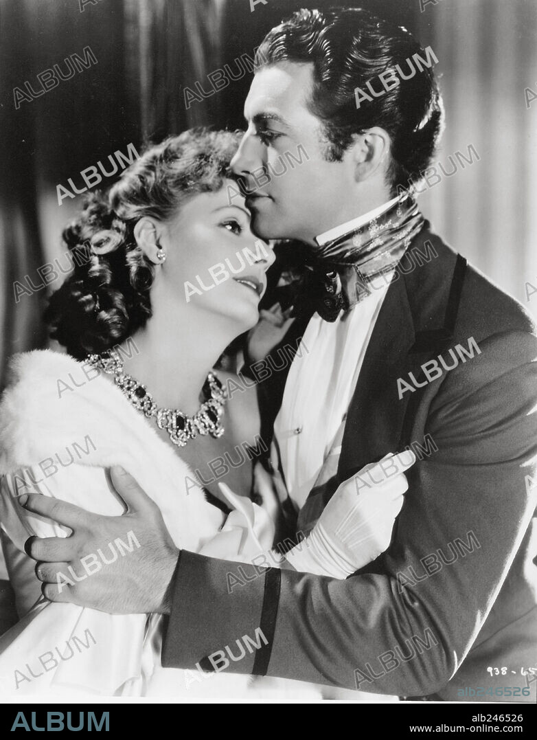 GRETA GARBO and ROBERT TAYLOR in CAMILLE, 1936, directed by GEORGE CUKOR. Copyright M.G.M.