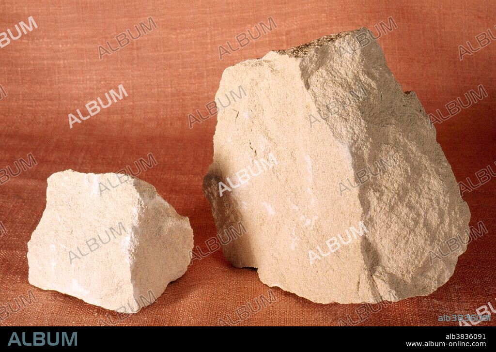 Oolitic limestone, a sedimentary rock made of close-packed calcium carbonate ooliths formed in a shallow marine environment.