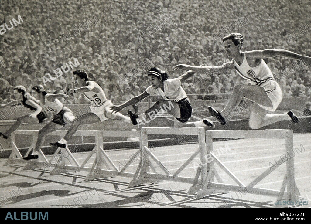 Photograph of Mildred Ella "Babe" Didrikson Zaharias (1911 - 1956) winning the 80m Hurdles at the 1932 Olympic games. Babe gained world fame in track and field and All-American status in basketball.