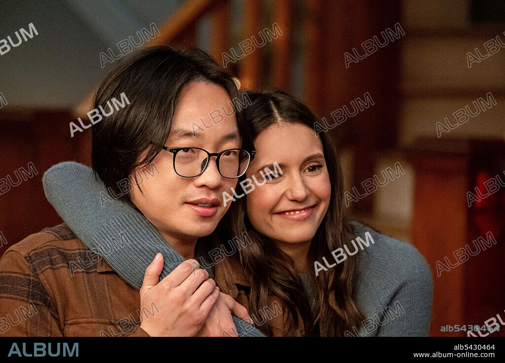 JIMMY O. YANG and NINA DOBREV in LOVE HARD, 2021, directed by HERNAN JIMENEZ. Copyright Wonderland Sound and Vision.