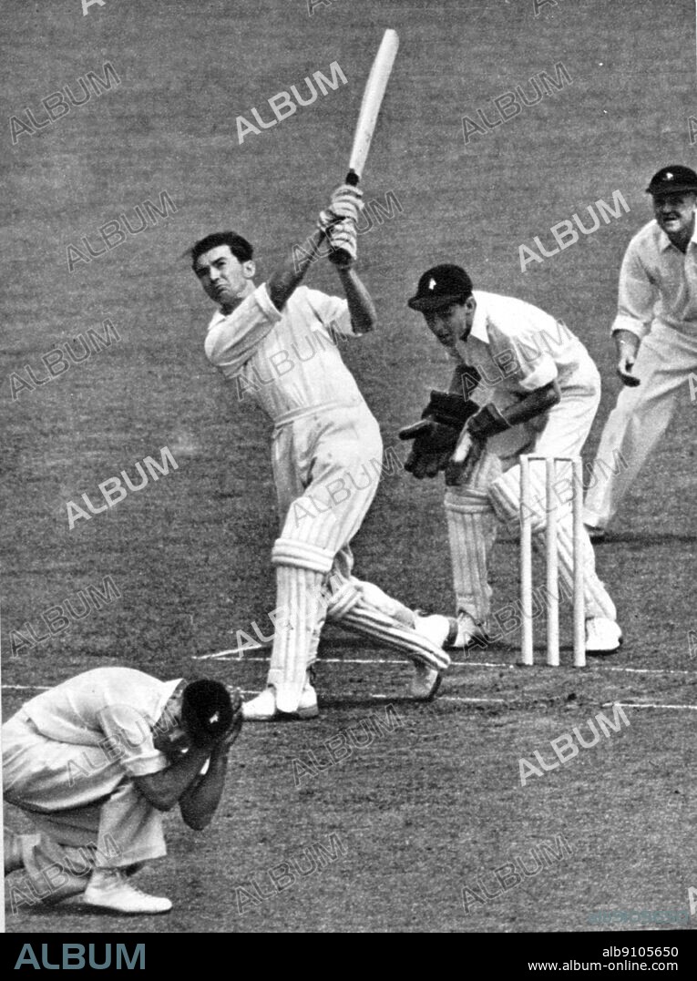 Reggie T Simpson hits a six in the second Test Match at Lord's 1951 E A B Rowan ducks at short leg. J H B Waite (wicket) and G M Fullerton (slip).