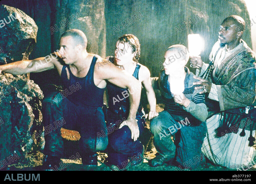 RADHA MITCHELL and VIN DIESEL in PITCH BLACK, 2000, directed by DAVID TWOHY. Copyright UNIVERSAL PICTURES / BARNES, SEAN.