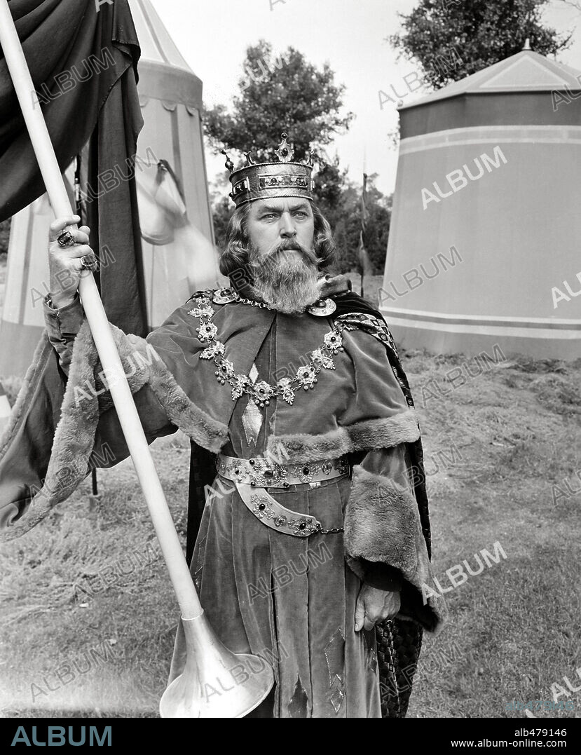 BRIAN AHERNE and Arthur. BRIAN AHERNE in PRINCE VALIANT, 1954, directed by HENRY HATHAWAY. Copyright 20TH CENTURY FOX.