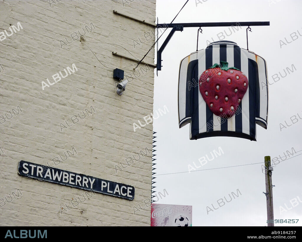 SIMON INGLIS. The Strawberry Public House, 7-8 Strawberry Place, Newcastle upon Tyne, 2010. The pub sign of The Strawberry public house, on the corner of Strawberry Place and Strawberry Lane, Newcastle upon Tyne. The Strawberry, also known as the Strawberry Inn, was built in the 19th century to serve pleasure gardens in area. It is now used by Newcastle United Football Club fans on match days. The Gallowgate east corner stand is also known as the Strawberry Corner, due to its proximity to the pub.