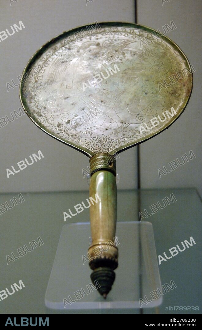 Etruscan bronze mirror with bone handle engraved with a scene depicting Thetis and Peleus. C. 350-325 BC. From Perugia, possibly made in Vulci. British Museum. London. England. United Kingdom.