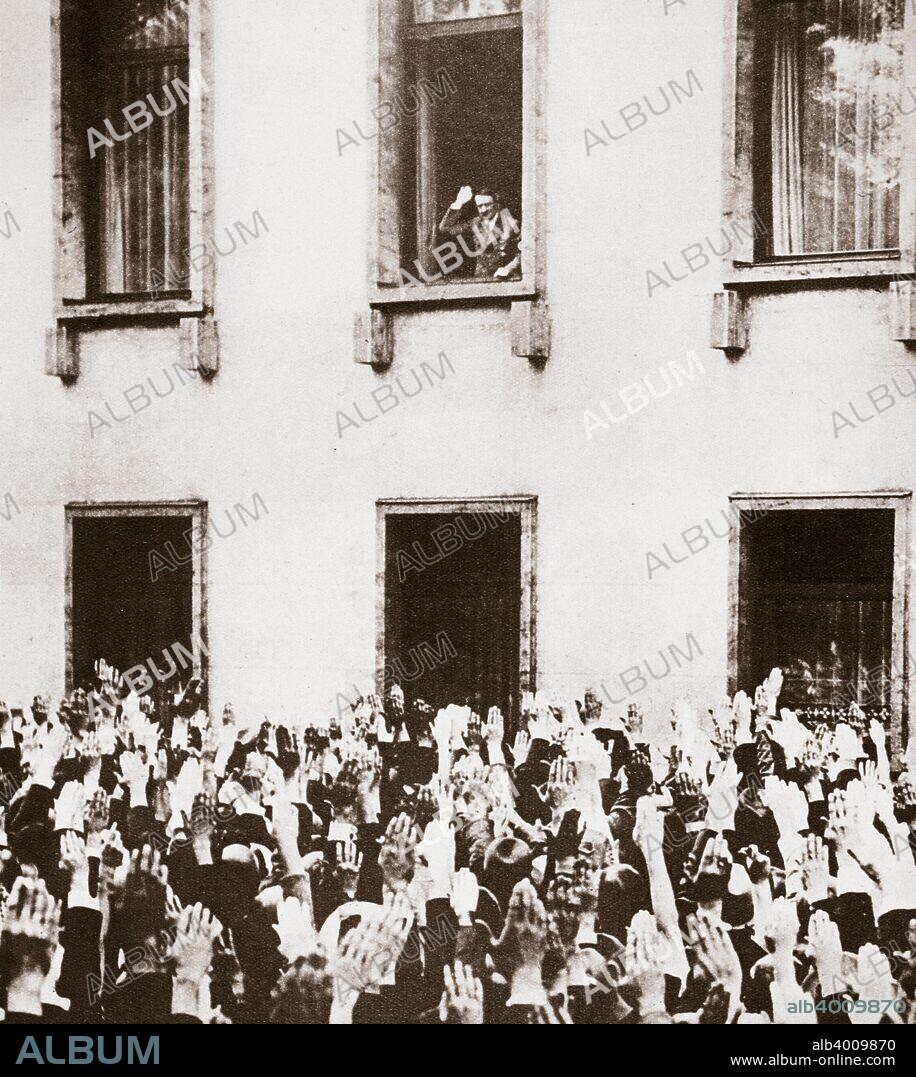 Adolf Hitler becomes Chancellor of Germany, 30 January 1933. Hitler (1889-1945), leader of the Nazi Party, looking down on the crowds as they cheered him after the election results were known.