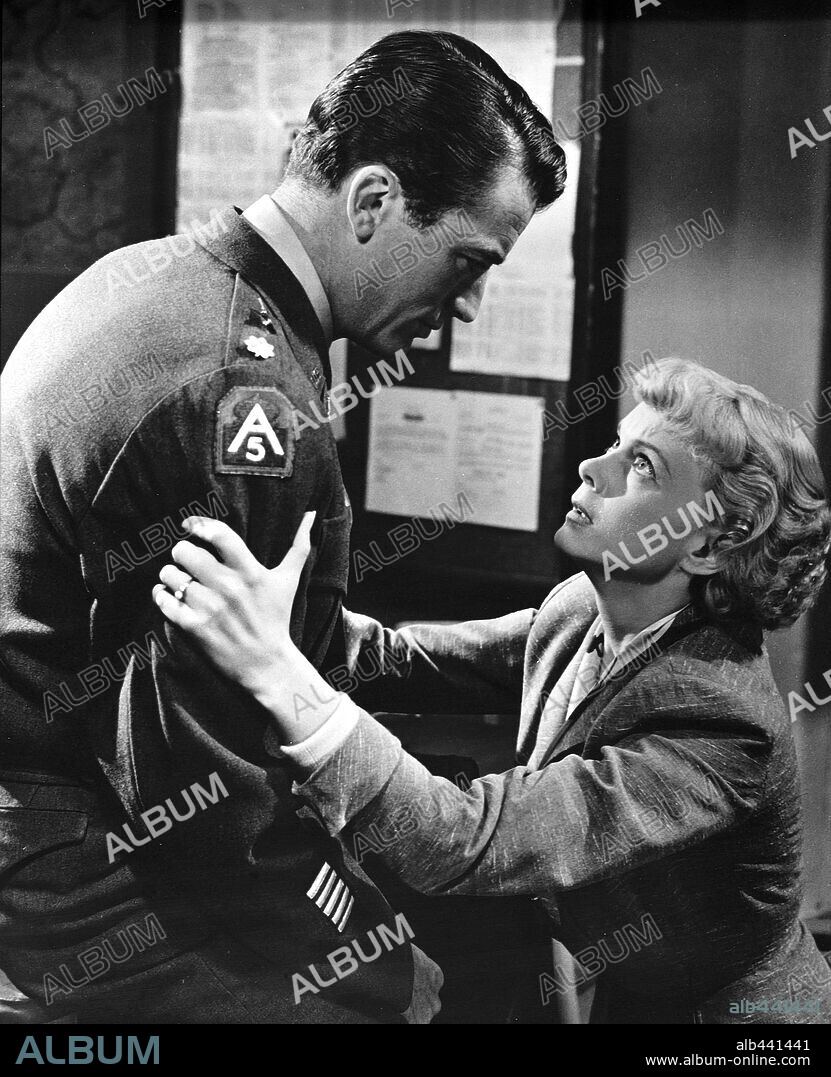 ANITA BJORK and GREGORY PECK in NIGHT PEOPLE, 1954, directed by NUNNALLY JOHNSON. Copyright 20TH CENTURY FOX.