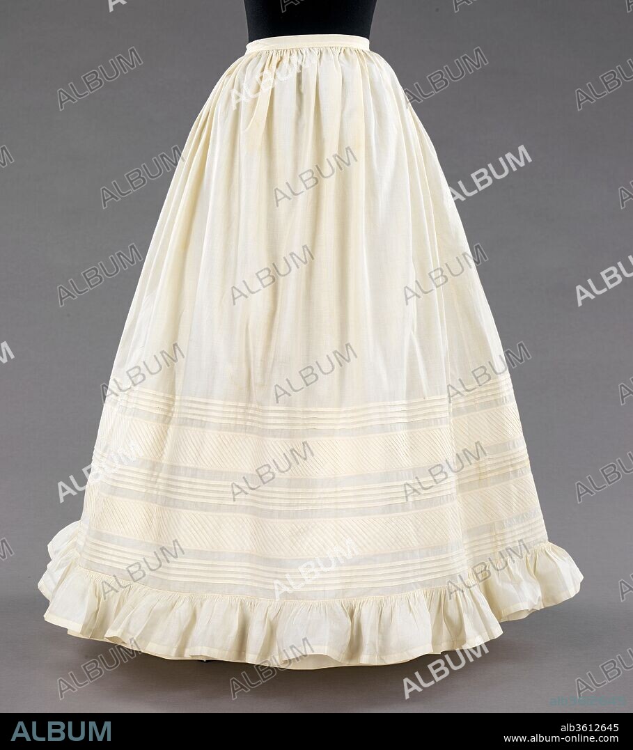 Petticoat. Culture: American. Date: 1850-60.
During the nineteenth century, women had an extensive array of underpinnings, which could include a chemise, drawers, corset, corset cover, camisole, skirt supports and petticoats. Although to the modest nineteenth-century woman, it would be scandalous for any of these items to be seen, some underclothes were made of sumptuous silks and beautifully decorated with embroidery, ribbons and lace. The meticulous horizontal and diagonal tucking on this petticoat, although done by machine, would have been time-consuming, and exemplifies the desire and importance during this time of having beautiful underclothes. The petticoat was the ideal palette for embroidered, tucked and pleated decorations accented with delicate lace and silky ribbons.