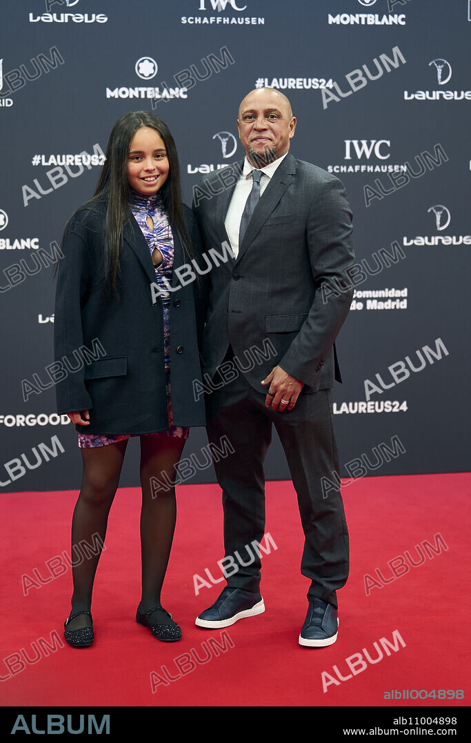 Roberto Carlos, Rebeca da Silva Rocha attends Laureus World Sports Awards Madrid 2024 - Red Carpet at Palacio de Cibeles on April 22, 2024 in Madrid, Spain.
