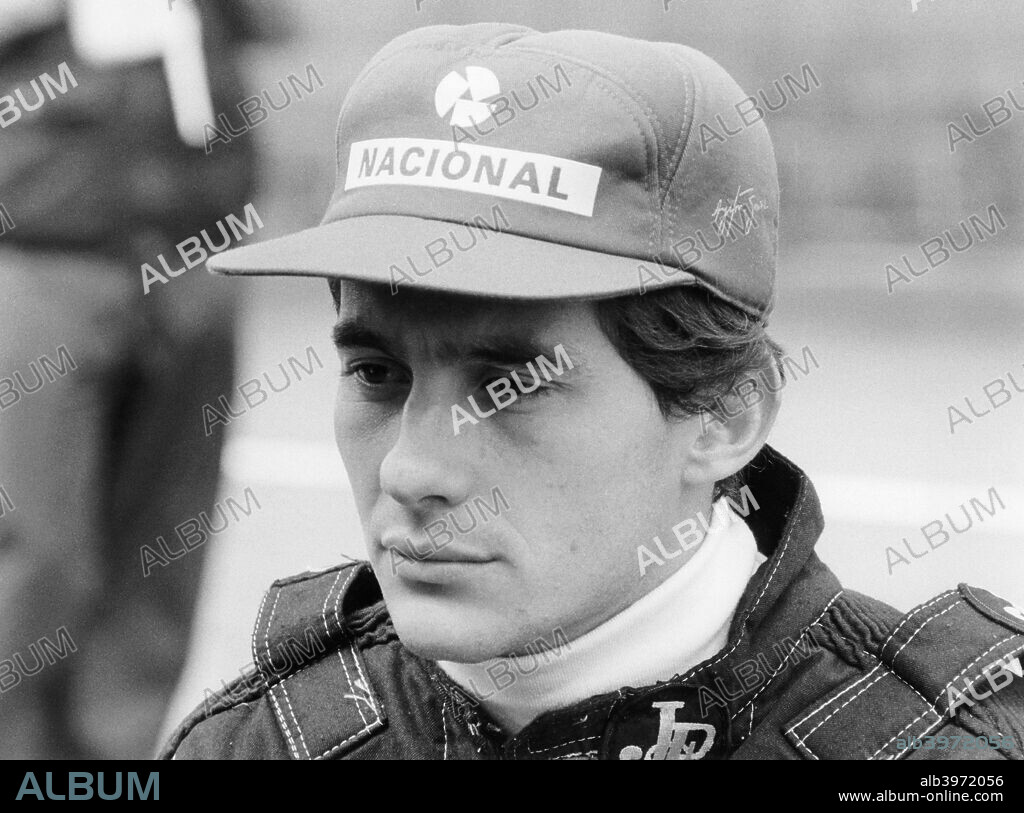 Ayrton Senna at the British Grand Prix, 1985. Starting racing in karting as a boy, Senna graduated to Formula 1 in 1984. He won his first race in atrocious wet conditions in Portugal the following season, and went on to add a further 40 victories, 61 qualifying pole positions and three World Drivers' Championships. His death in the San Marino Grand Prix in 1994 shocked the sport and led to the introduction of greatly improved safety measures.
