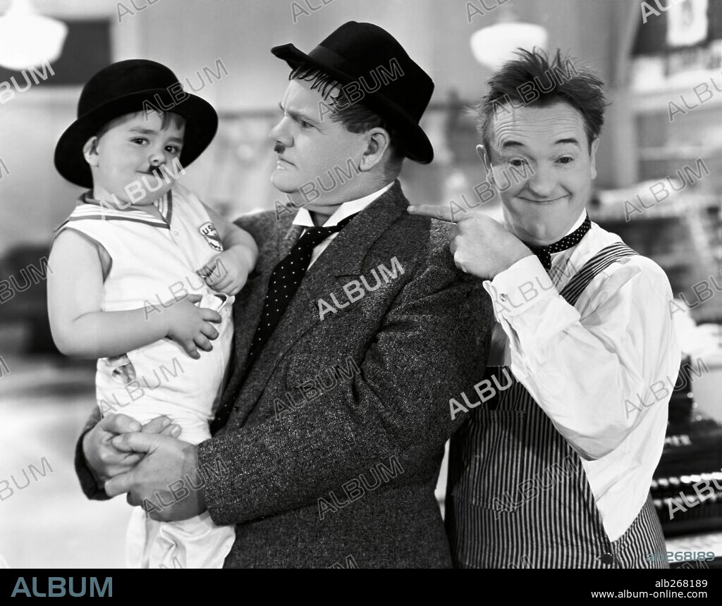OLIVER HARDY, SPANKY and STAN LAUREL in TIT FOR TAT, 1935, directed by CHARLEY ROGERS. Copyright HAL ROACH/MGM.