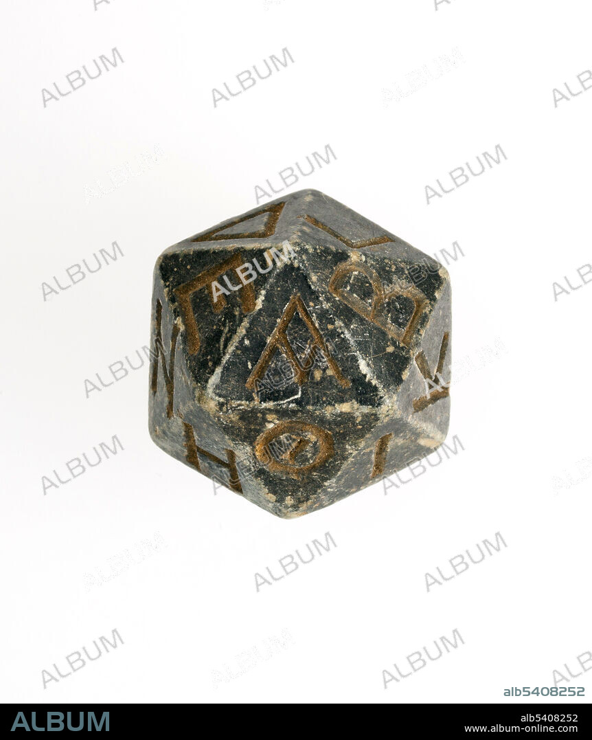 Twenty-sided die (icosahedron) with faces inscribed with Greek letters. Serpentinite. Ptolemaic Period–Roman Period, 2nd century B.C.–4th century A.D., Egypt.
