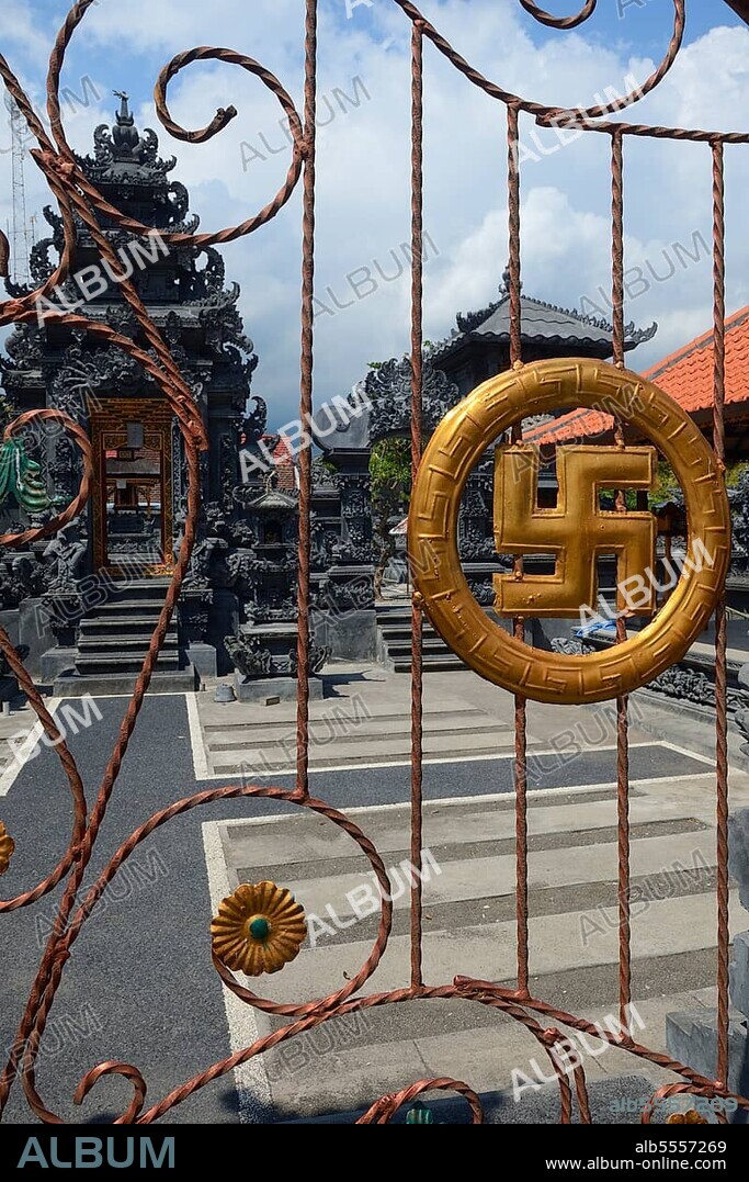 Gate with swastika as swastika, symbol of luck in Hinduism, Temple Pura Segara, Lovina Beach, North Bali, Bali, Indonesia, Asia.