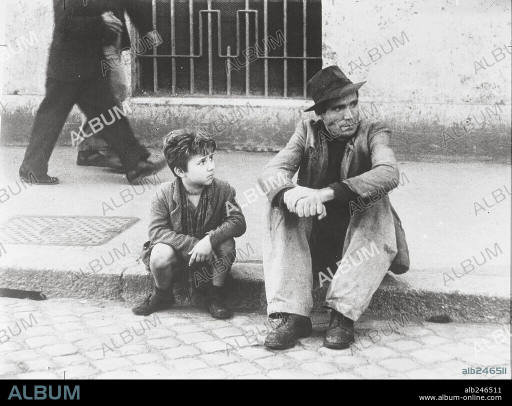 ENZO STAIOLA and LAMBERTO MAGGIORANI in BICYCLE THIEF, 1948 (LADRI DI BICICLETTE), directed by VITTORIO DE SICA. Copyright PDS/ENIC.
