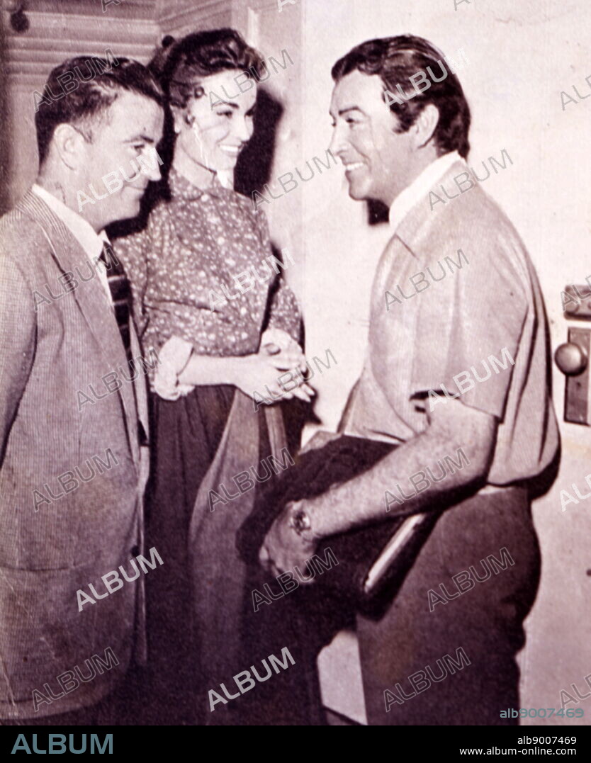 Photograph of Ann Blyth and James McNulty with Robert Taylor.