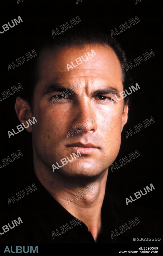 STEVEN SEAGAL in ABOVE THE LAW, 1988, directed by ANDREW DAVIS. Copyright WARNER BROTHERS.