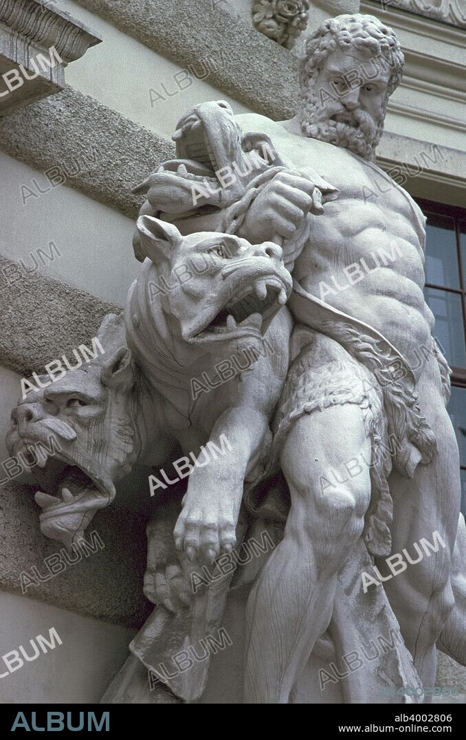 Hercules is capturing Cerberus and completeing his twelfth labour. This is from the portal of the Michaelertrakt, Hofburg, Vienna.