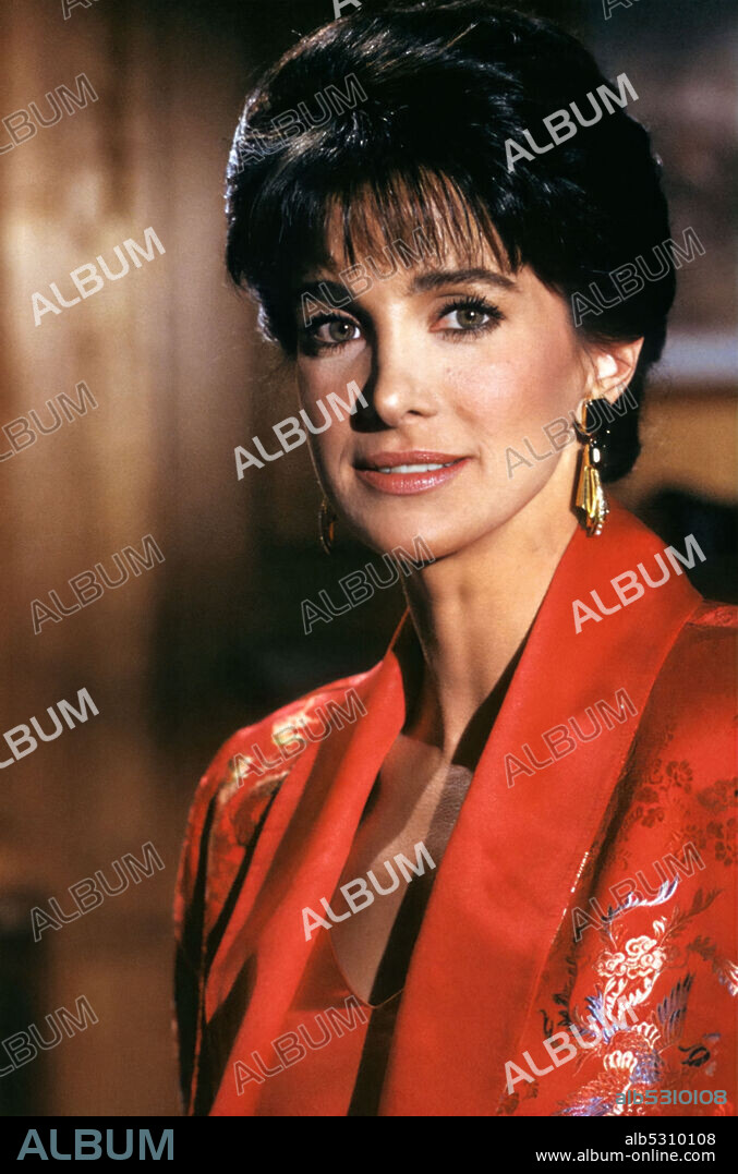 CONNIE SELLECCA in HOTEL, 1983, directed by JAMES BROLIN, JEROME COURTLAND and VINCENT MCEVEETY. Copyright Aaron Spelling Productions.