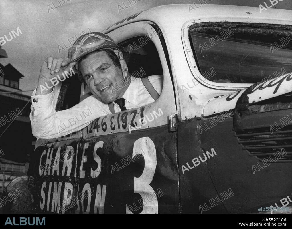 "Fearless Freddie" - Stock car Driver.
Do you recognise the Cheerful smile. Freddie Mills, the boxer who showed now fear in the ring is out to show that he has no fear on the track..
Freddie Mills, former world light heavyweight boxing champion, who since his retirement has become a restaurant owner and boxing promoter, tried out the stock cars at Harringay this afternoon.
He will watch tonight's racing and may take part in the next meeting. August 13, 1954. (Photo by Paul Popper, Paul Popper Ltd.).