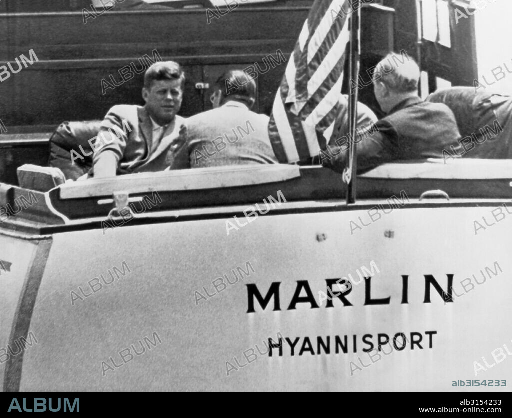 Hyannis Port, Massachusetts:  c. 1962  President Kennedy confers with top aides, Robert McNamara, Dean Rusk, and  Gen. Maxwell Taylor aboard the yacht Marlin in Nantucket Sound in Hyannis Port.