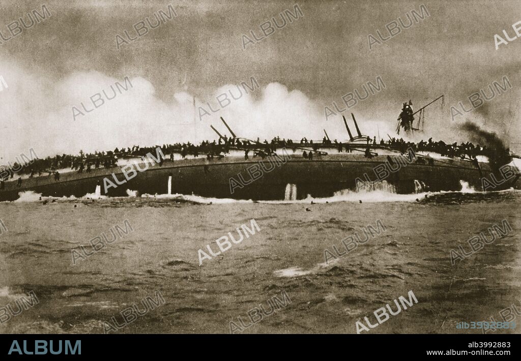 The sinking of the German cruiser 'Blücher' in the North Sea, World War I, January 24, 1915. The SMS 'Blücher' was sunk by the Royal Navy during the Battle of Dogger Bank. She sustained over 70 hits from British shells before rolling over and sinking, continuing to return fire until the end. Only 237 of her crew of 792 were rescued.