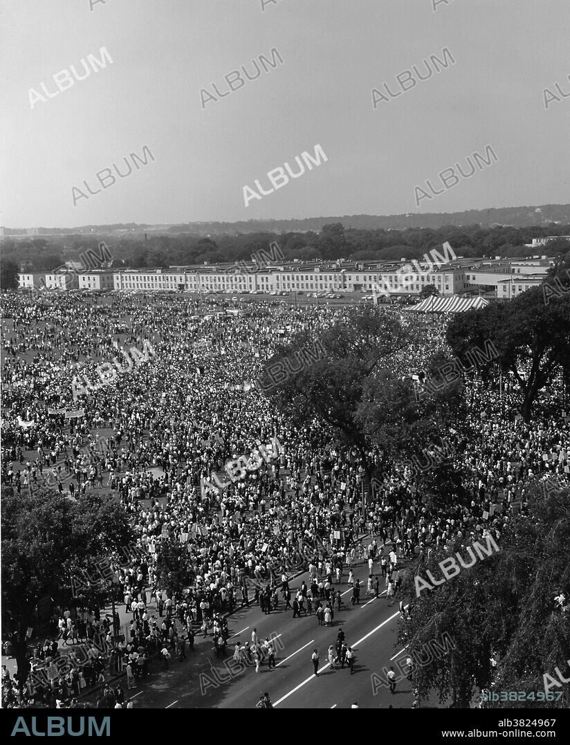 Entitled: "Aerial view of the crowd of marchers on the mall and street." The March on Washington for Jobs and Freedom was one of the largest political rallies for human rights in United States history and called for civil and economic rights for African-Americans. On Wednesday, August 28, 1963. Martin Luther King, Jr., standing in front of the Lincoln Memorial, delivered his historic "I Have a Dream" speech in which he called for an end to racism. The march was organized by a group of civil rights, labor, and religious organizations, under the theme "jobs, and freedom". Estimates of the number of participants varied from 200,000 to 300,000; it is widely accepted that approximately 250,000 people participated in the march. Observers estimated that 75-80% of the marchers were black. The march is credited with helping to pass the Civil Rights Act (1964) and preceded the Selma Voting Rights Movement which led to the passage of the Voting Rights Act (1965).