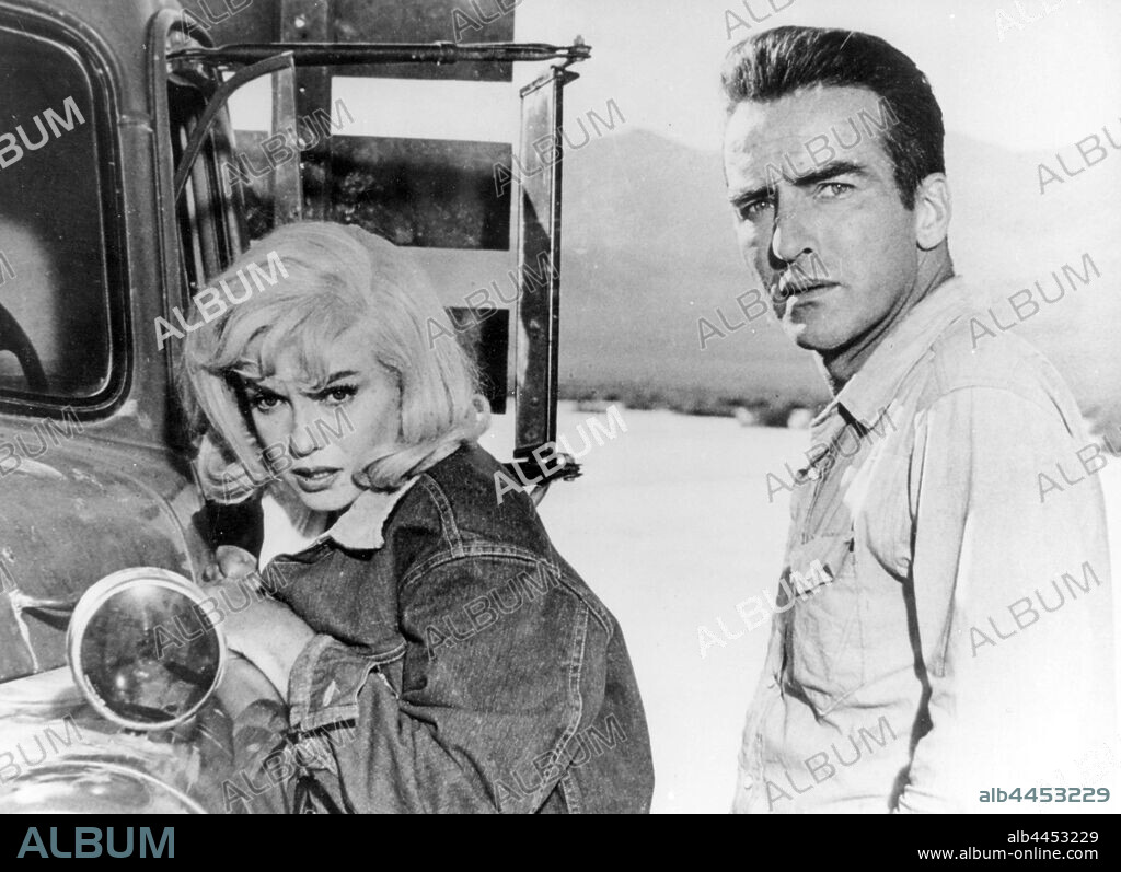 NORMA JEAN BAKER and MONTGOMERY CLIFT. MARILYN MONROE and MONTGOMERY CLIFT in THE MISFITS, 1961, directed by JOHN HUSTON. Copyright UNITED ARTISTS/SEVEN ARTS.