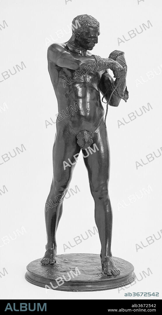 Caestus. Artist: Charles Henry Niehaus (American, Cincinnati, Ohio 1855-1935 Grantwood, New Jersey). Dimensions: 35 1/4 x 15 x 15 in. (89.5 x 38.1 x 38.1 cm). Date: 1883-85; cast 1901.
The Munich-trained Niehaus modeled Caestus in Rome, combining the inspiration of ancient sculpture with his penchant for anatomical realism. The work depicts a rigidly posed athlete preparing for a fight by binding leather straps in a crisscross pattern around his forearms. This arrangement of straps, known as a caestus, was the ancient Roman equivalent of the modern day boxing glove. Lead or iron weights were often secured over the knuckles to increase the impact of the blows.