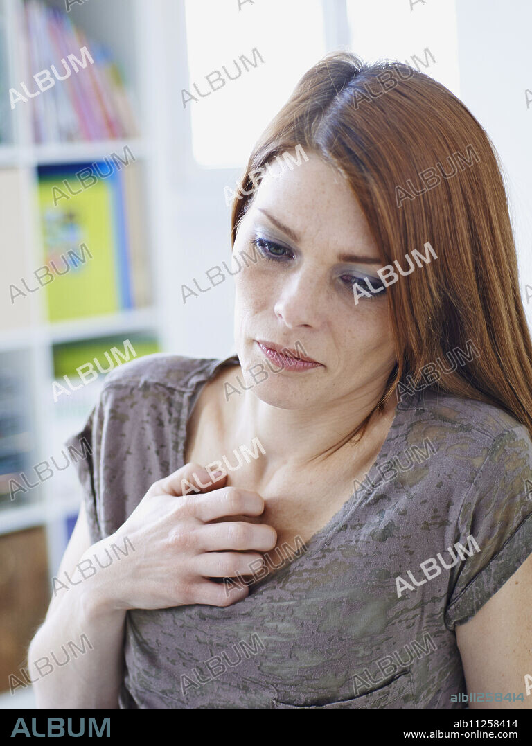 Woman scratching herself.