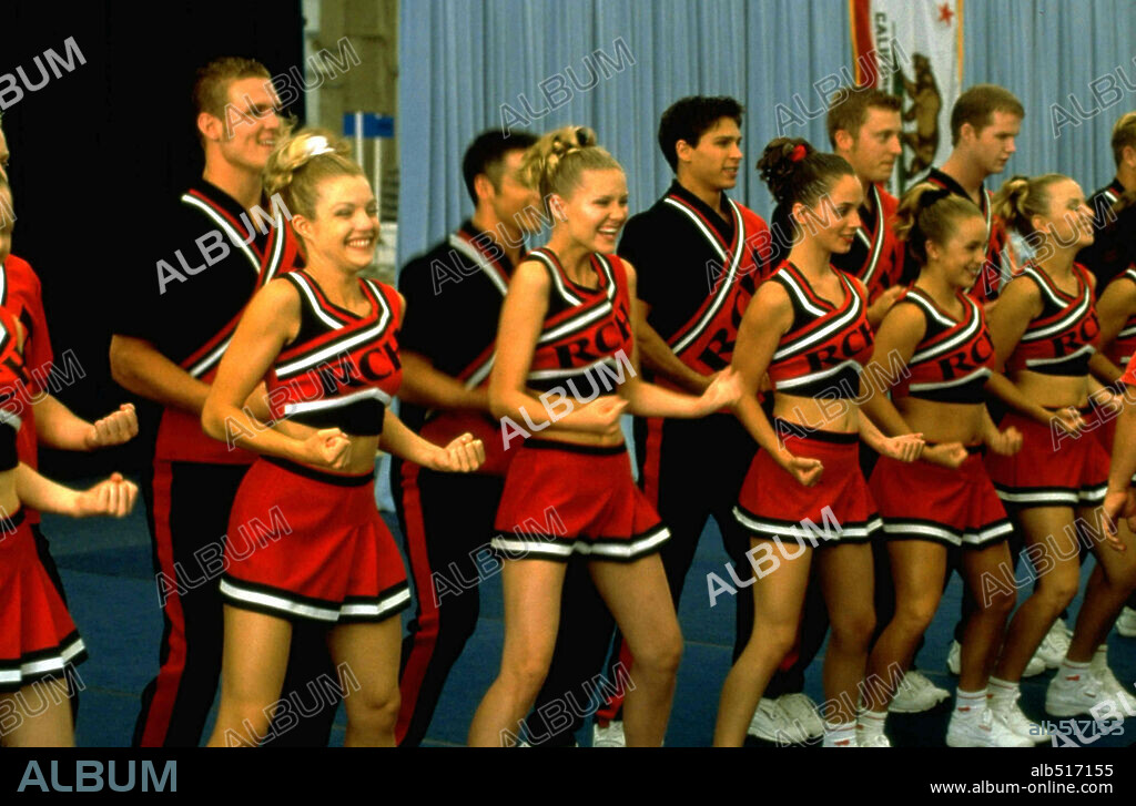 ELIZA DUSHKU and KIRSTEN DUNST in BRING IT ON, 2000, directed by PEYTON REED. Copyright BEACON COMMUNICATIONS LLC.