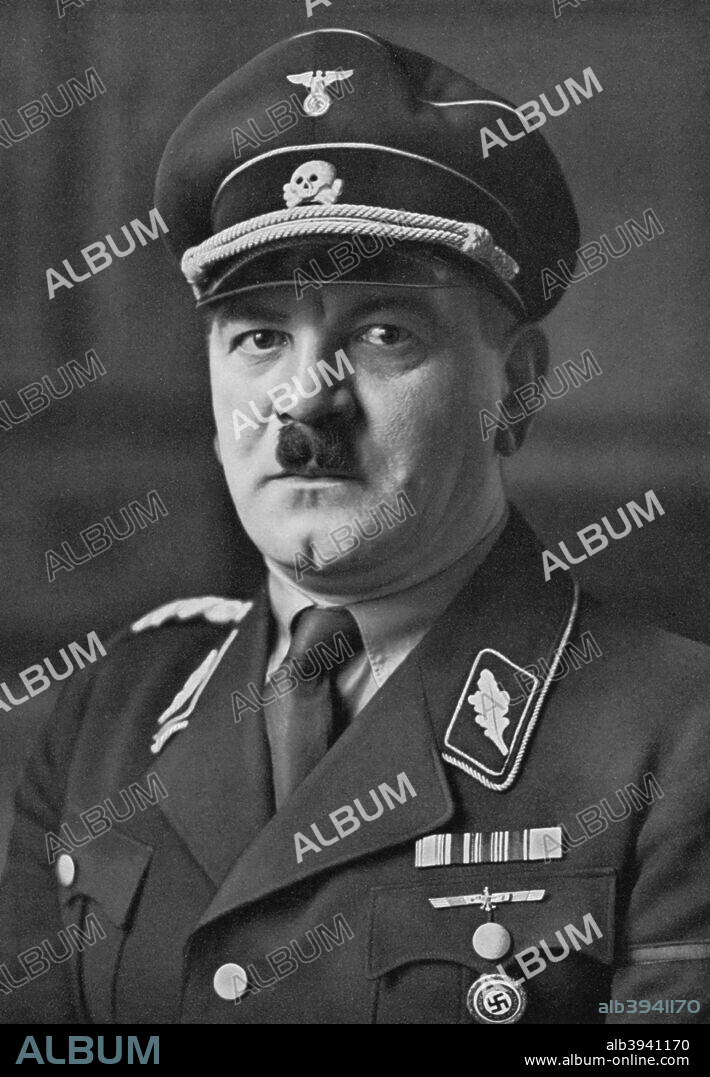Julius Schreck, member of the SS and chauffeur of Adolf Hitler, 1933. Schreck (1898-1936) joined the Nazi Party in 1920 at about the same time as Hitler, with whom he became good friends. He took part in the Munich Beer Hall Putsch in 1923 and in 1925 became the first commander of the Schutzstaffel (SS) in its original form as Hitler's personal bodyguard. He stood down from the post in 1926 and worked as Hitler's personal chauffeur for six years before retiring due to ill health. He died of meningitis on 16 May 1936 and was given a state funeral at which Hitler delivered a eulogy. A print from Adolf Hitler. Bilder aus dem Leben des Führers, Hamburg: Cigaretten/Bilderdienst Hamburg/Bahrenfeld, 1936.