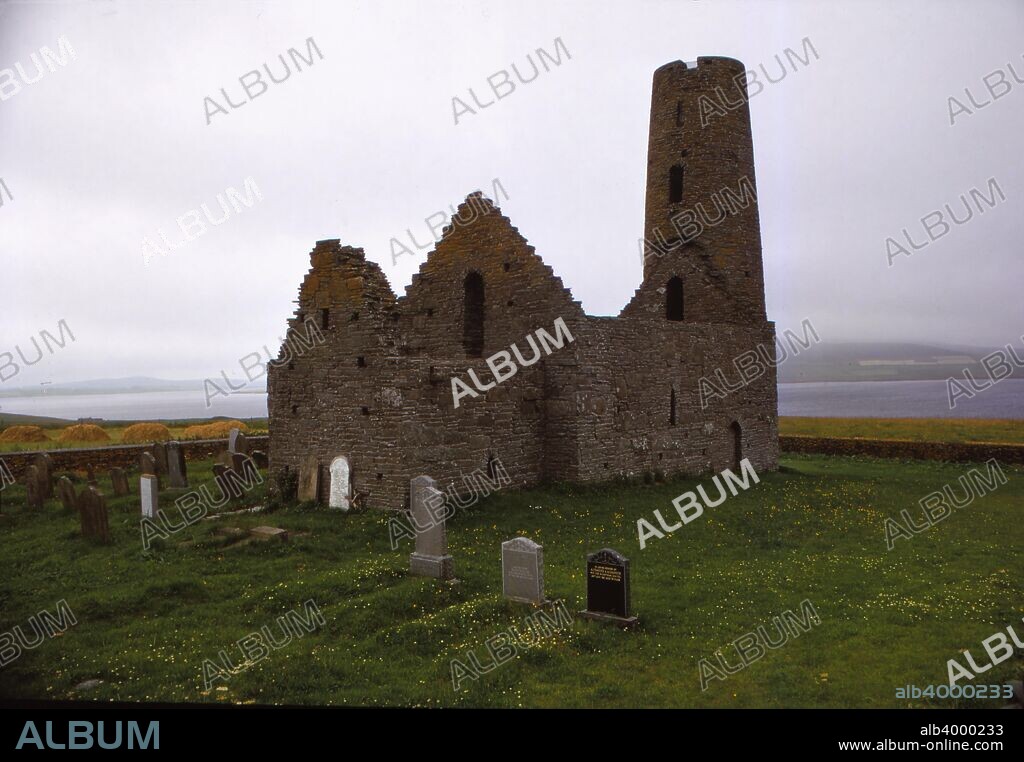 Church of St. Magnus, 12th century, Isle of Egilsay, Orkney, Scotland, 20th century.  A 12th century Irish style round tower, rare in Scotland, and unique in Orkney.  Built in 1117, where St. Magnus was martyred by an axe blow to the head. While the church is dedicated to him, the foundation may be far older.