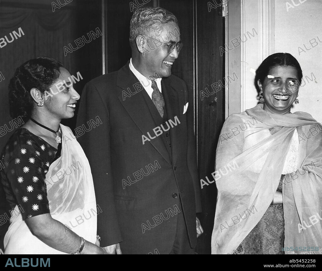 The Begum Rahman wife of the High Commissioner for Pakistan with Minister for Philippines Dr. Robert Regala & Mrs. A. Alvie. September 04, 1955.
