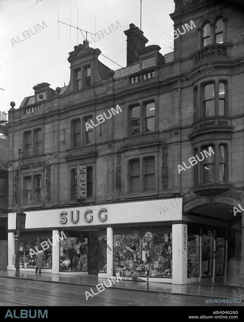Sugg Sport, Pinstone Street store, Sheffield, South Yorkshire, 1960. The Pinstone Street store of Sugg Sport in Sheffield, showing the three story shop unit with a variety of sports and electrical goods on display in the window. Frank Howe Sugg (1862-1933) was one of the few sportsmen to achieve a 'Derbyshire double', to have played at least one first team game for both Derbyshire County Cricket Club and Derby County Football Club. Well known throughout the sporting word, he later bacame an umpire after his playing career ended and formed Sugg Sports in 1888. The business was a great success and was a leading supplier of football, cricket and fishing equipment. The company continued trading until 2002.