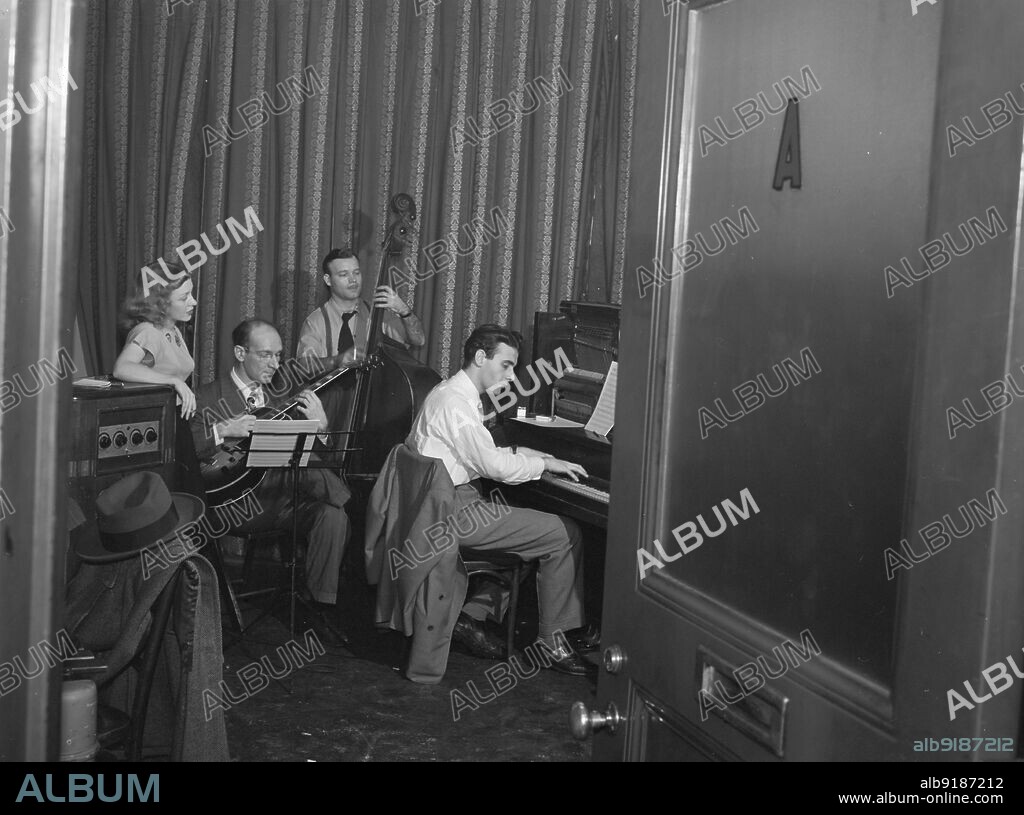 WILLIAM PAUL GOTTLIEB. Portrait of Helen Carr, Sammy Herman, Joe Bianco, and Donn Trenner, Nola's, New York, N.Y., ca. Feb. 1947.