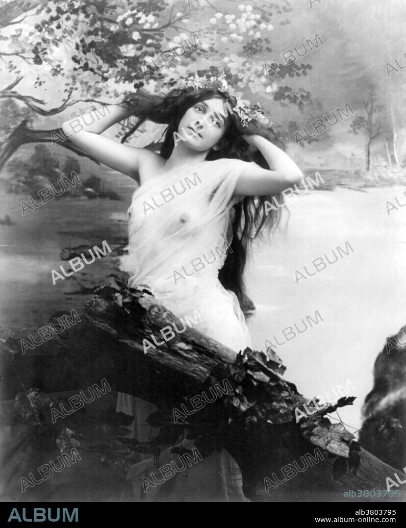 Entitled: "Young woman modeling: nude with garland of flowers." Photographed by Fitz W. Guerin, 1903. Erotic photography is a style of art photography of an erotic and even a sexually suggestive or sexually provocative nature. Erotic photography is generally a composed image of a subject in a still position. Though the subjects of erotic photography are usually completely or mostly unclothed, that is not a requirement. Erotic photography should be distinguished from nude photography, which contains nude subjects not necessarily in an erotic situation, and pornographic photography, which is of a sexually explicit nature.