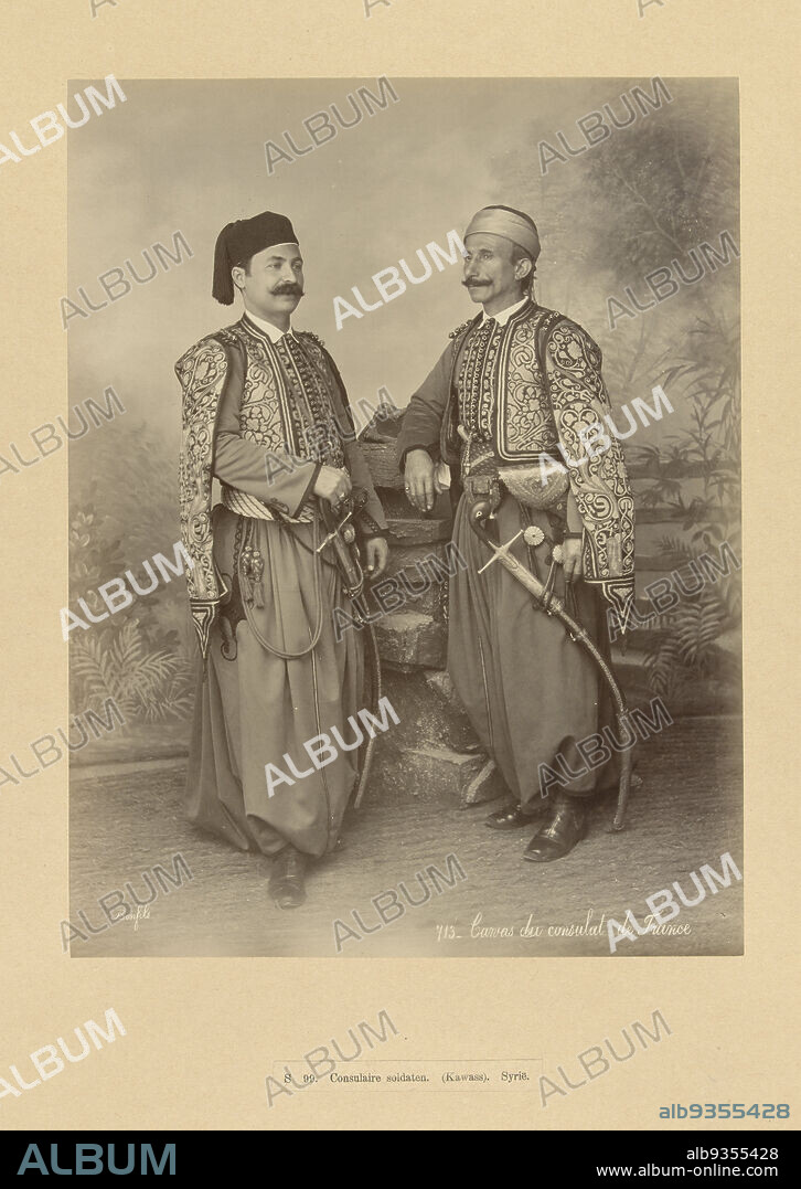 s 99. Consular soldiers. (Kawass). Syria. (title on object), Syria (series title), Banvas du consulate de France (title on object), Portrait of two consular soldiers. The photo is part of the photo series of Syria collected by Richard Polak., Bonfils, Damascus, c. 1867 - c. 1876, photographic support, paper, albumen print, height 274 mm × width 220 mmheight 556 mm × width 443 mm.