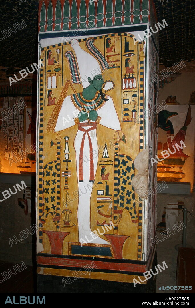 Wall painting showing, Osiris, the god of the afterlife, underworld, and rebirth, in ancient Egyptian religion. Inside the tomb (QV66) of Nefertari, in Egypt's Valley of the Queens. It was discovered by Ernesto Schiaparelli in 1904. It is called the Sistine Chapel of Ancient Egypt. In the Valley of the Queens, Nefertari's tomb once held the mummified body and representative symbolisms of her, like what most Egyptian tombs consisted of. Now, everything had been looted except for two thirds of the 5,200 square feet of wall paintings. ca. 1255 BC.