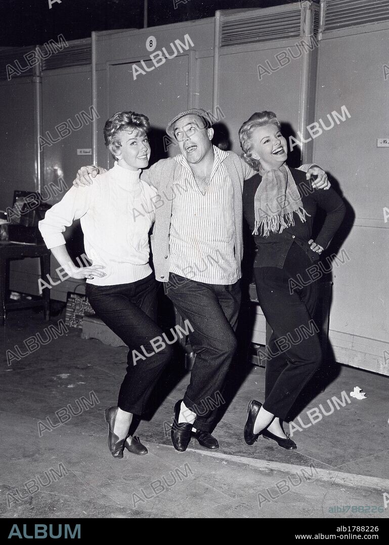 DORIS DAY, ELISABETH FRASER and GENE KELLY in THE TUNNEL OF LOVE, 1958, directed by GENE KELLY. Copyright M.G.M.