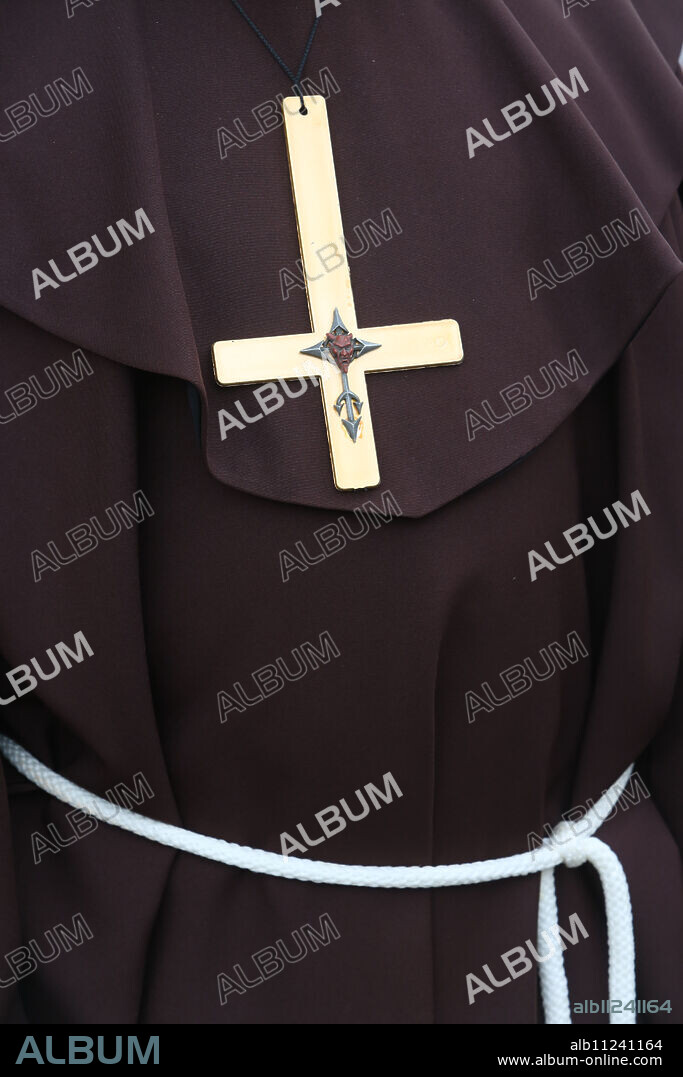 Upside down cross or inverted cross. Symbol of the Devil and the Antichrist. Anti-Christian symbol.