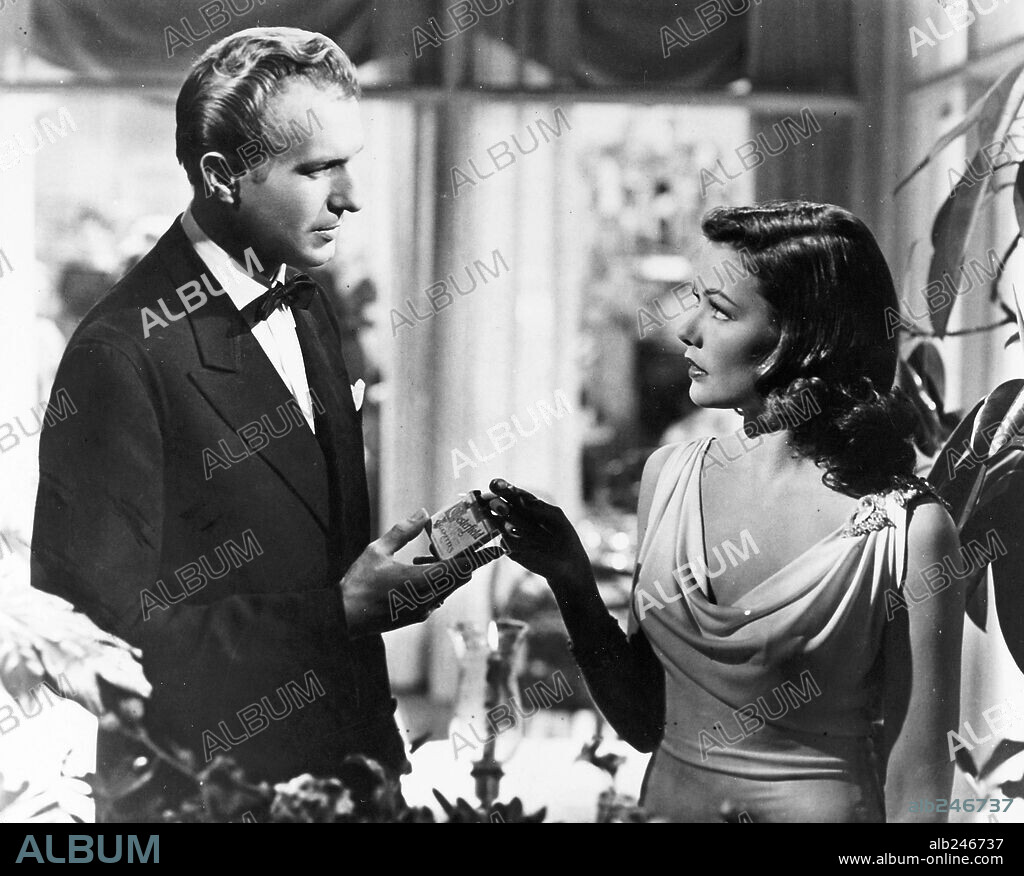 GENE TIERNEY and VINCENT PRICE in LAURA, 1944, directed by OTTO PREMINGER. Copyright Twentieth Century-Fox.