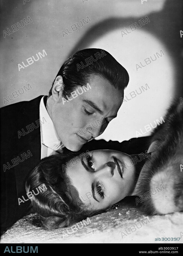 DONNA REED and HURD HATFIELD in THE PICTURE OF DORIAN GRAY, 1945, directed by ALBERT LEWIN. Copyright M.G.M.