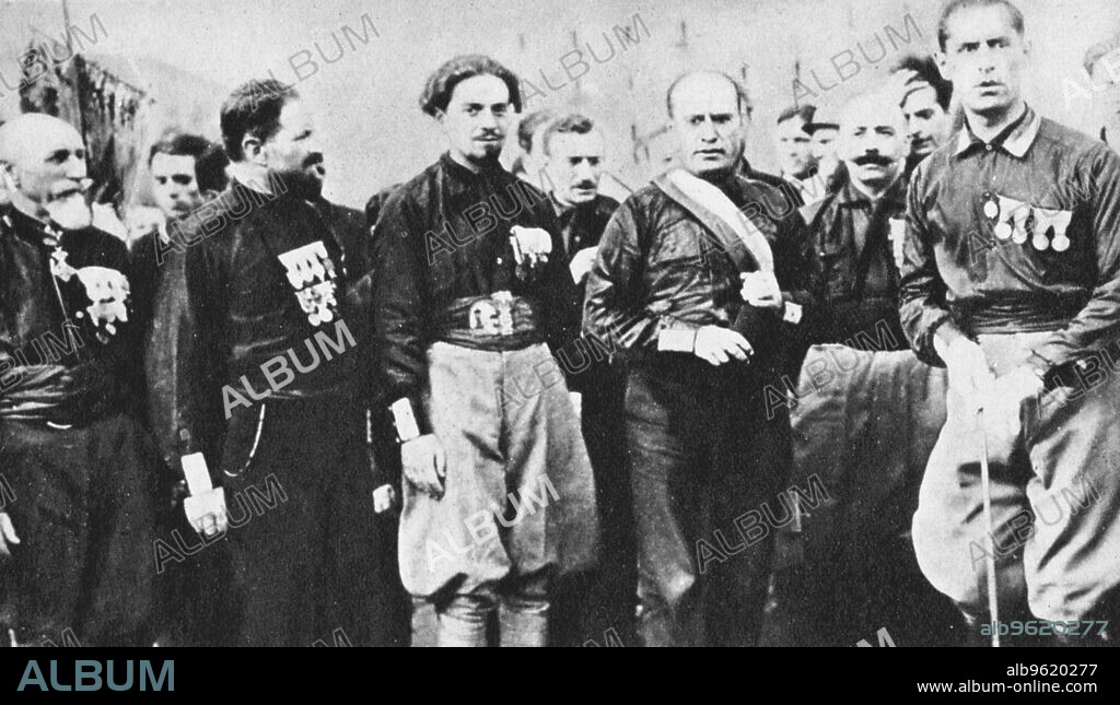 Benito Mussolini (1883-1945) Italian fascist dictator, often refered to as Il Duce, centre right, leading the march on Rome, 1922.